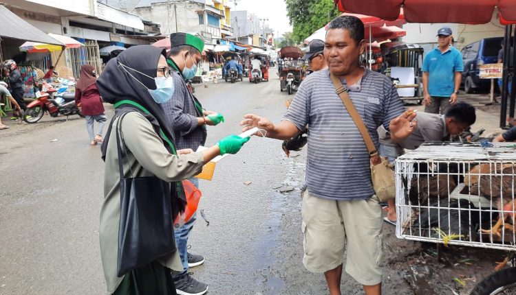 Milad HMI Ke-74, HMI Cabang BMR Bagi-bagi Masker Gratis